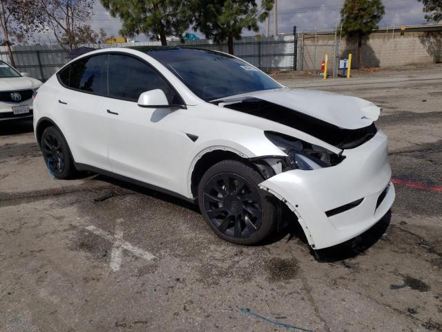 Photo 4 from auction – 2022 TESLA MODEL Y with VIN 7SAYGDEE6NF555363