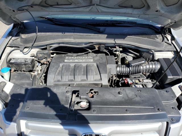 Photo 11 from auction – 2006 HONDA PILOT EX with VIN 2HKYF18546H533309