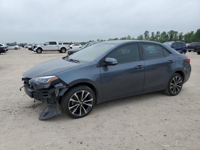 TOYOTA COROLLA L 2017 with VIN 5YFBURHE9HP671928 - Photo from auction