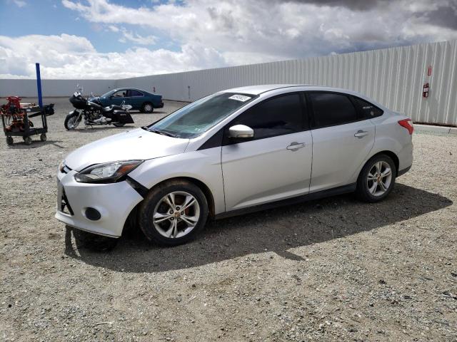 FORD FOCUS SE 2014 with VIN 1FADP3F28EL169525 - Photo from auction