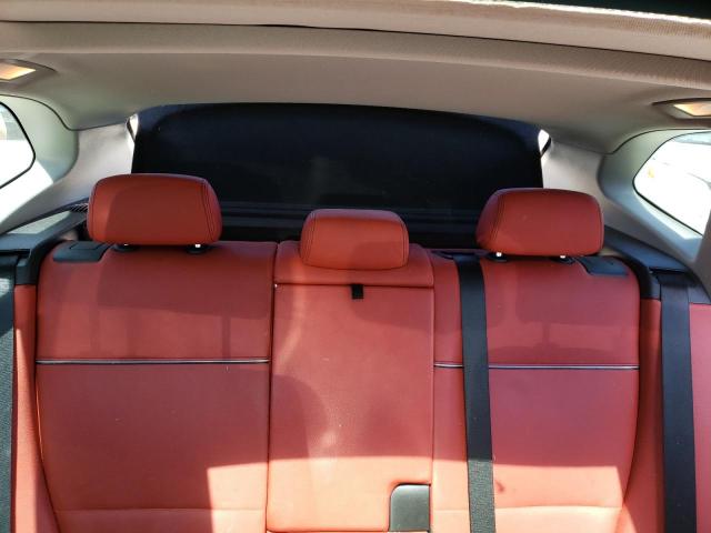 Photo 10 from auction – 2013 BMW X1 SDRIVE2 with VIN WBAVM1C56DVW43501