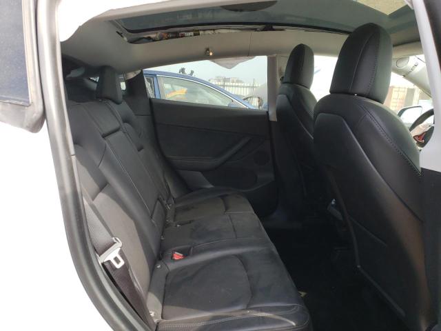 Photo 11 from auction – 2021 TESLA MODEL Y with VIN 5YJYGDED5MF116402
