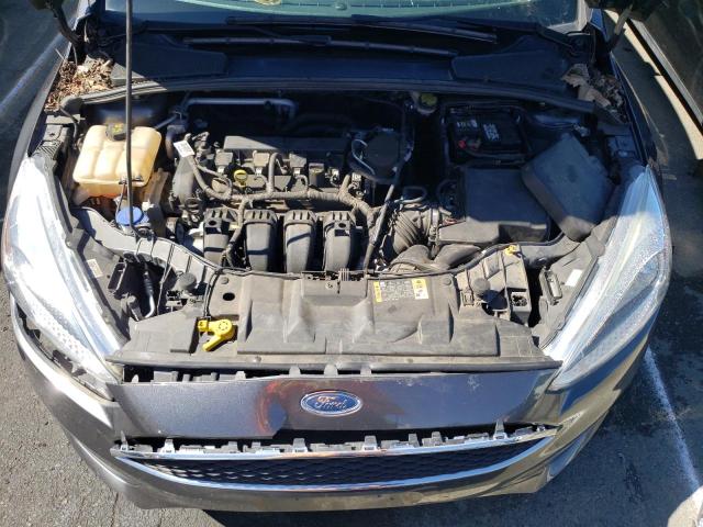 Photo 11 from auction – 2015 FORD FOCUS SE with VIN 1FADP3K29FL358563