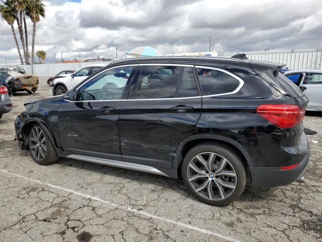 Photo 2 from auction – 2017 BMW X1 XDRIVE2 with VIN WBXHT3C35H5F81453