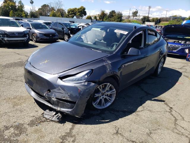 TESLA MODEL Y 2021 with VIN 5YJYGAEE3MF270551 - Photo from auction