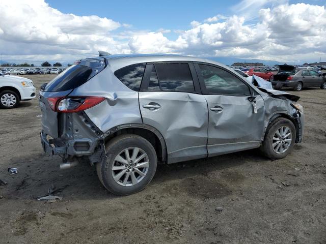 Photo 3 from auction – 2015 MAZDA CX-5 SPORT with VIN JM3KE2BE0F0482869