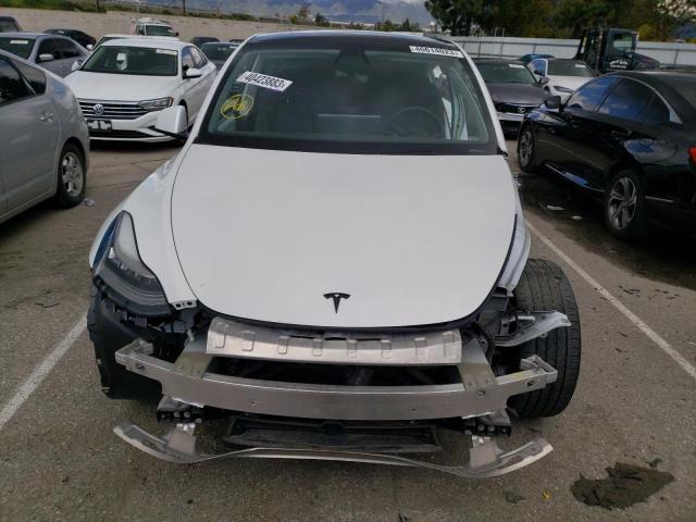 Photo 5 from auction – 2021 TESLA MODEL Y with VIN 5YJYGDEE2MF077695