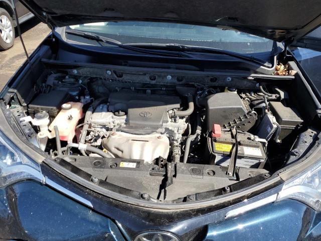 Photo 12 from auction – 2018 TOYOTA RAV4 LE with VIN JTMBFREV7JJ242215