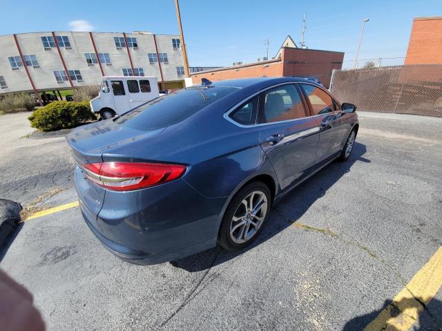 Photo 4 from auction – 2019 FORD FUSION TIT with VIN 3FA6P0RU7KR204234