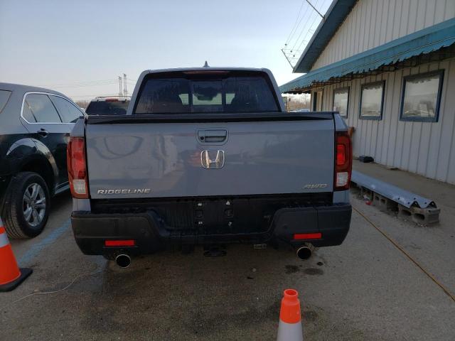 Photo 6 from auction – 2022 HONDA RIDGELINE with VIN 5FPYK3F75NB037967