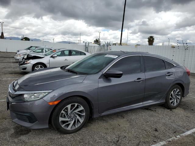 HONDA CIVIC EX 2018 with VIN 2HGFC2F70JH580835 - Photo from auction