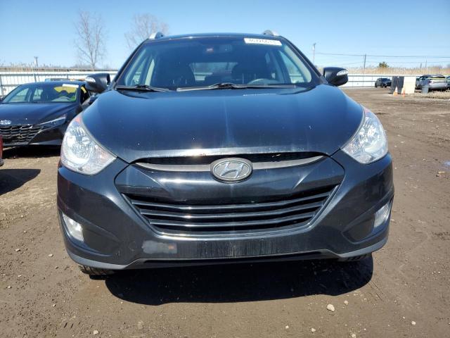 Photo 5 from auction – 2013 HYUNDAI TUCSON with VIN KM8JUCAC7DU774162