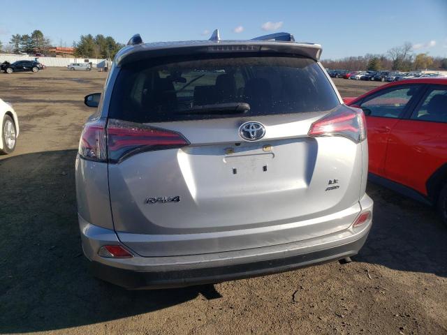 Photo 6 from auction – 2018 TOYOTA RAV4 LE with VIN JTMBFREV8JJ216934