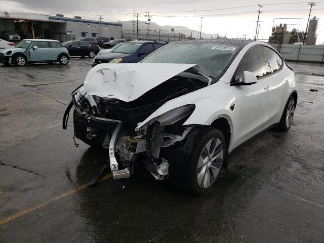 TESLA MODEL Y 2022 with VIN 7SAYGDEE8NF308393 - Photo from auction