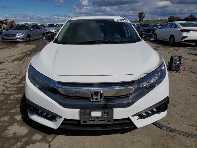 Photo 5 from auction – 2016 HONDA CIVIC LX with VIN 2HGFC2F54GH510617