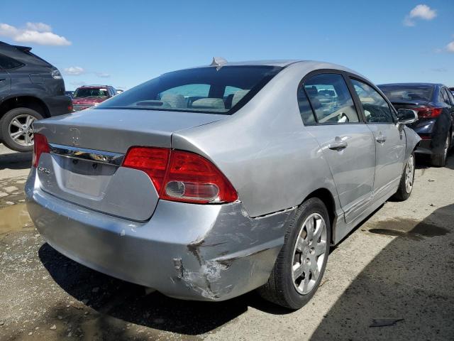 Photo 3 from auction – 2010 HONDA CIVIC LX with VIN 19XFA1F5XAE068895