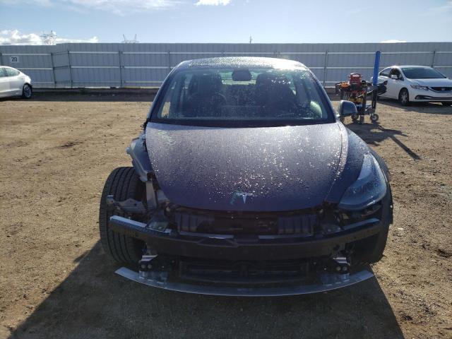 Photo 5 from auction – 2022 TESLA MODEL 3 with VIN 5YJ3E1EB1NF305028