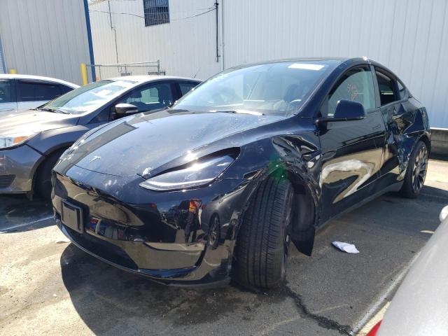 TESLA MODEL Y 2022 with VIN 7SAYGDEF0NF338528 - Photo from auction