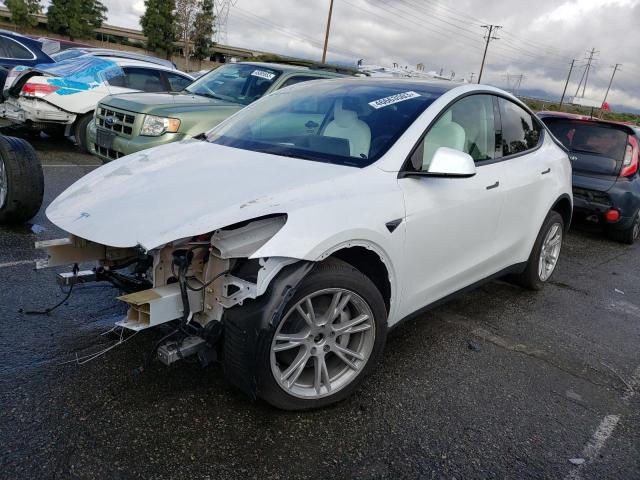 TESLA MODEL Y 2023 with VIN 7SAYGDEE3PF606823 - Photo from auction