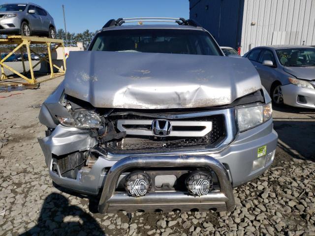 Photo 5 from auction – 2011 HONDA RIDGELINE with VIN 5FPYK1F59BB006722