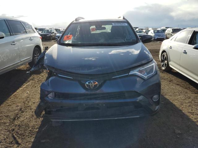 Photo 5 from auction – 2017 TOYOTA RAV4 XLE with VIN JTMRFREV5HJ716039