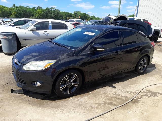FORD FOCUS SE 2014 with VIN 1FADP3F24EL153175 - Photo from auction