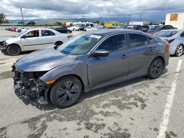 HONDA CIVIC EX 2018 with VIN JHMFC1F84JX013040 - Photo from auction
