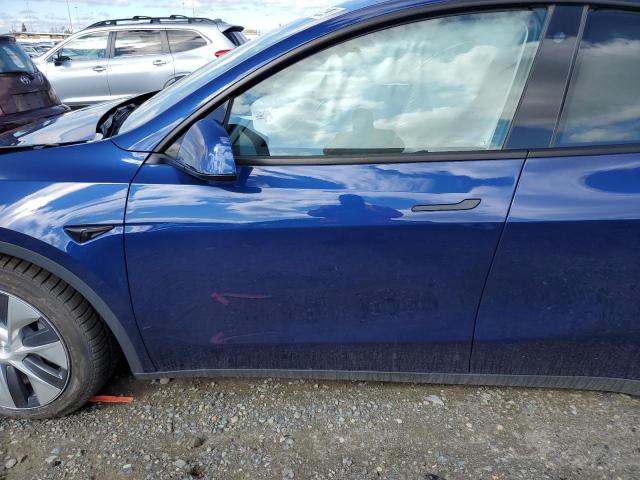Photo 7 from auction – 2023 TESLA MODEL Y with VIN 7SAYGDEEXPF585839