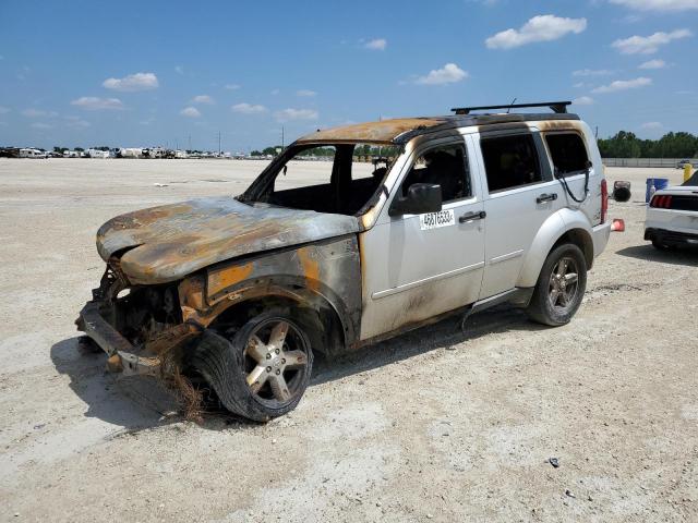 DODGE NITRO SXT 2010 with VIN 1D4PT5GK6AW105024 - Photo from auction
