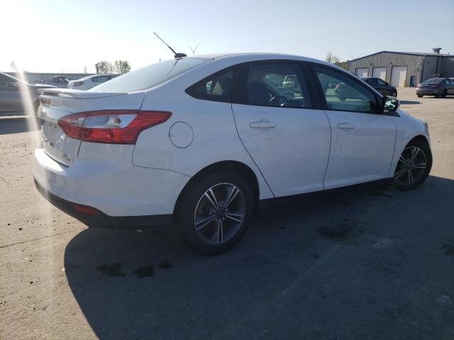 Photo 3 from auction – 2014 FORD FOCUS SE with VIN 1FADP3F20EL402748