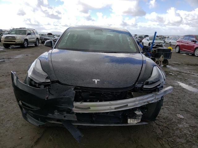 Photo 5 from auction – 2021 TESLA MODEL 3 with VIN 5YJ3E1EA2MF094640