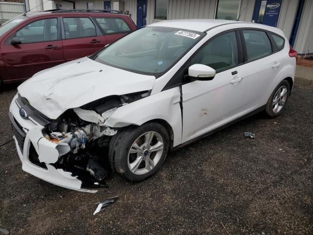 FORD FOCUS SE 2014 with VIN 1FADP3K23EL320051 - Photo from auction