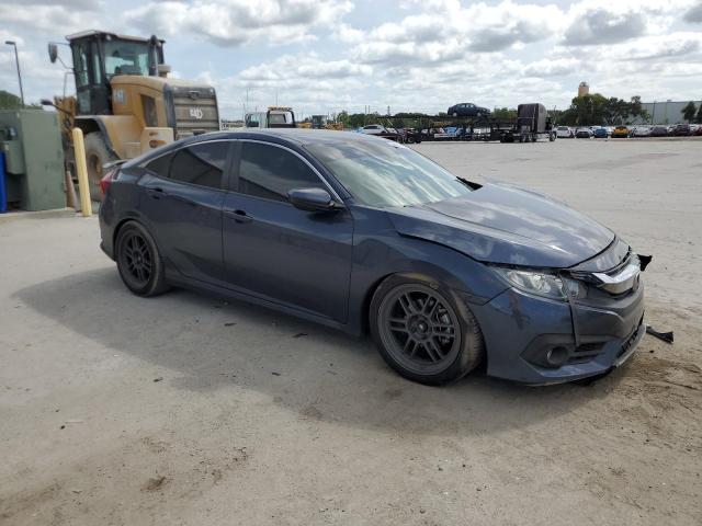 Photo 4 from auction – 2018 HONDA CIVIC with VIN 19XFC2F5XJE042880