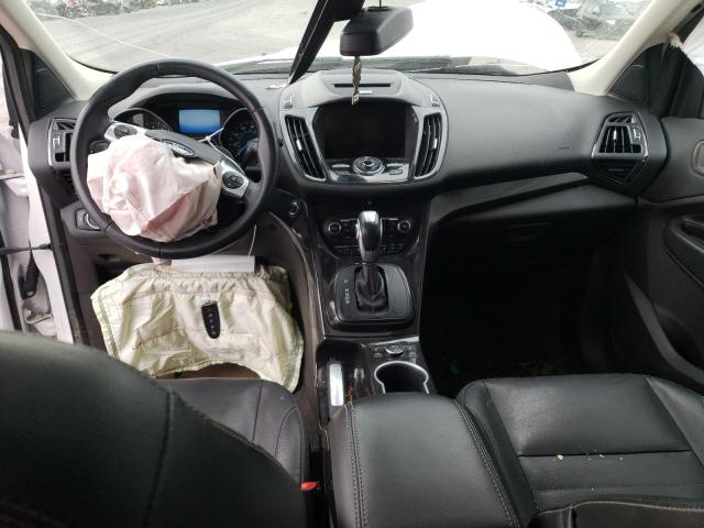 Photo 8 from auction – 2014 FORD ESCAPE TIT with VIN 1FMCU9JXXEUD06622