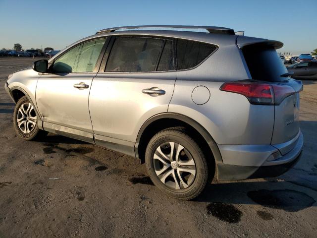 Photo 2 from auction – 2018 TOYOTA RAV4 LE with VIN JTMZFREV8JJ160332