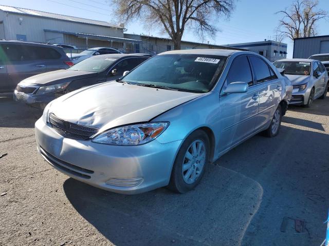 TOYOTA CAMRY LE 2002 with VIN 4T1BF30K82U008252 - Photo from auction