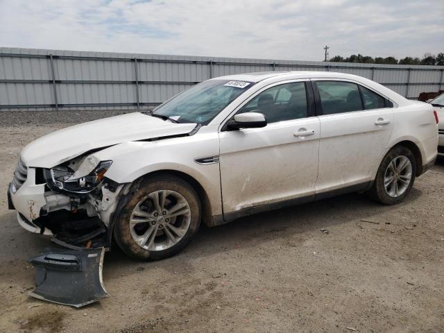FORD TAURUS SEL 2017 with VIN 1FAHP2H82HG106284 - Photo from auction