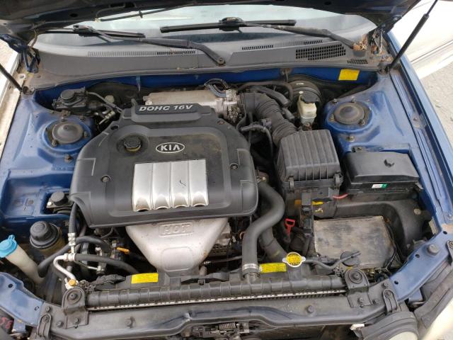 Photo 11 from auction – 2004 KIA OPTIMA LX with VIN KNAGD126245333431