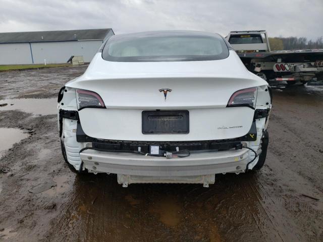Photo 6 from auction – 2021 TESLA MODEL 3 with VIN 5YJ3E1EB9MF049056