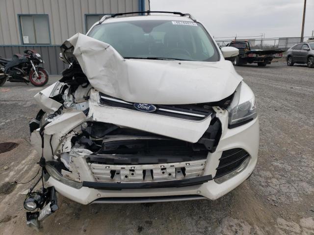 Photo 5 from auction – 2014 FORD ESCAPE TIT with VIN 1FMCU9JXXEUD06622