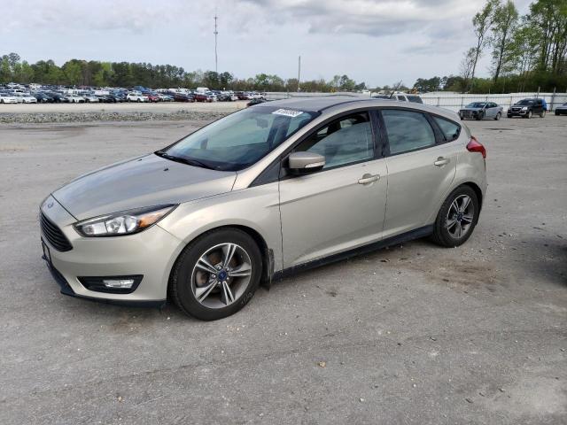 FORD FOCUS SE 2016 with VIN 1FADP3KE4GL210221 - Photo from auction