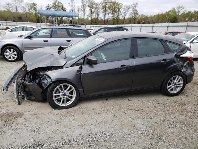 FORD FOCUS SE 2018 with VIN 1FADP3K26JL326288 - Photo from auction