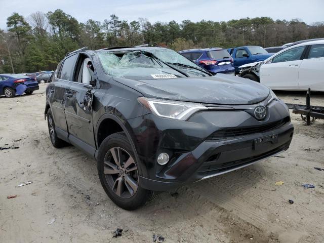 Photo 4 from auction – 2017 TOYOTA RAV4 XLE with VIN 2T3RFREV9HW690451