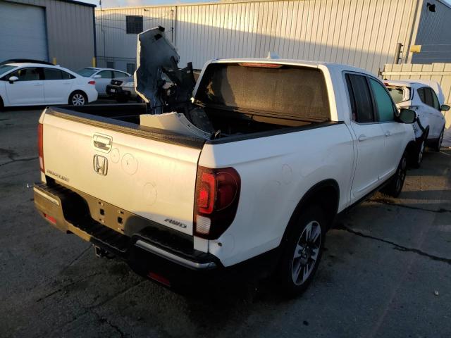 Photo 3 from auction – 2017 HONDA RIDGELINE with VIN 5FPYK3F59HB018177