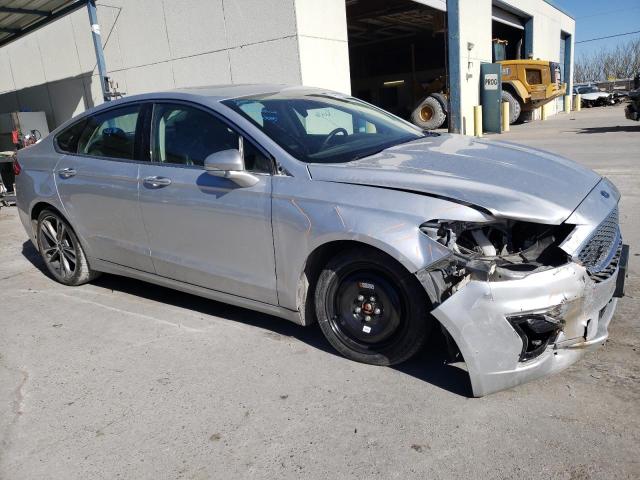Photo 4 from auction – 2019 FORD FUSION TIT with VIN 3FA6P0D91KR139786