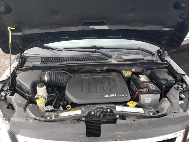 Photo 11 from auction – 2011 VOLKSWAGEN ROUTAN SE with VIN 2V4RW3DG8BR669730