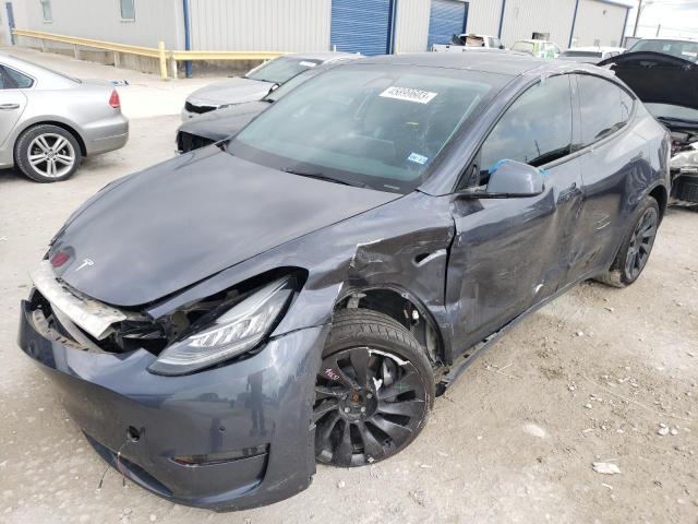 TESLA MODEL Y 2022 with VIN 7SAYGDEE4NA002207 - Photo from auction