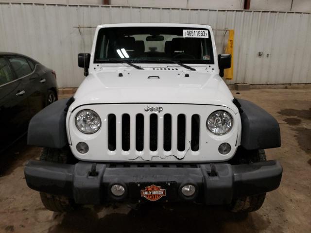 Photo 5 from auction – 2015 JEEP WRANGLER S with VIN 1C4AJWAG0FL608026