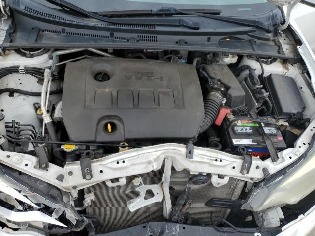 Photo 11 from auction – 2014 TOYOTA COROLLA L with VIN 5YFBURHE9EP111497
