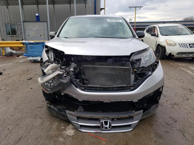Photo 5 from auction – 2014 HONDA CR-V LX with VIN 2HKRM3H34EH508641